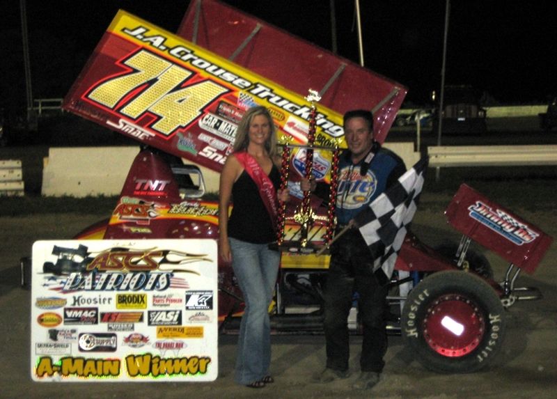 Gordy Button pressed the ASCS Patriots for his first career series feature win in Saturday night's Bill Alhart Memorial at Genesee Speedway in Batavia, NY.