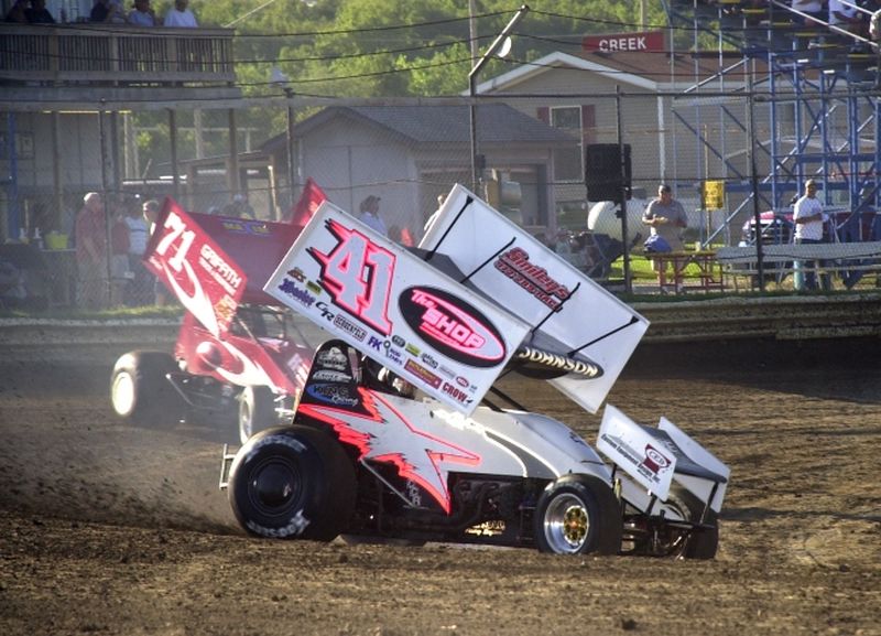 Jason Johnson (41) leads Channin Tankersley (71) through Creek County Speedway's turns one and two during Monday night's 16th Annual Toyota Tundra ASCS Sizzlin' Summer Speedweek action.