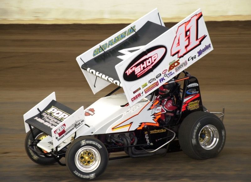 Jason Johnson hustles Lanny Row's Wesmar-powered The Shop Motorsports/Custom Equipment Design No. 41 Eagle around Lucas Oil Speedway in Wheatland, MO, where he won Saturday night's 25-lap O'Reilly ASCoT main event.