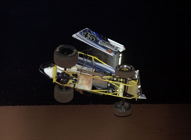 Kolt Walker flips on the opening lap of Saturday night's 25-lap American Bank of Oklahoma ASCS Sooner Region feature at Lawton Speedway.