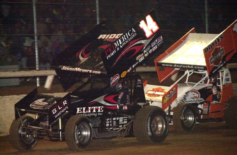 Jason Meyers (14) slips ahead of Shane Stewart (1hd) on the 39th lap STN