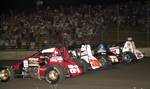 Robert Ballou (81) and Tim Kaeding (10k) lead the four-wide salute Lake Side KC