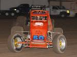 Charles Davis, Jr. (50) in front of Jeremy Sherman (77) in Saturday night's Discount Tire Co. ASCS Canyon Region event at Manzanita Speedway in Phoenix, AZ.