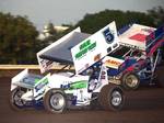 Gary Tayor (5*) races with Tim Crawley in Friday night's 16th Annual Toyota Tundra ASCS Sizzlin' Summer Speedweek action at Oklahoma City's State Fair Speedway.