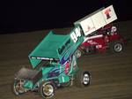 ASCS Midwest Region champion Natalie Sather (94s) races underneath Kim Kennedy