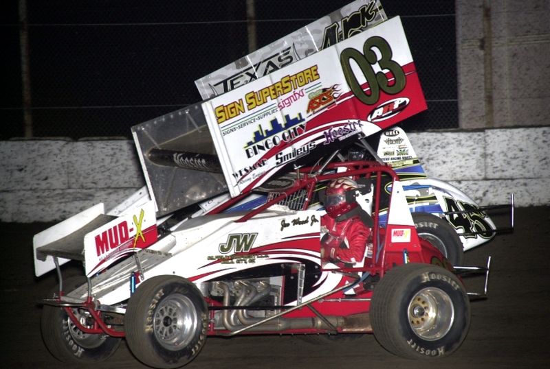 Joe Wood, Jr. (03) dices with Kolt Walker (45k) in American Bank of Oklahoma ASCS Sooner Region action at Texas' Kennedale Speedway Park on Friday night.