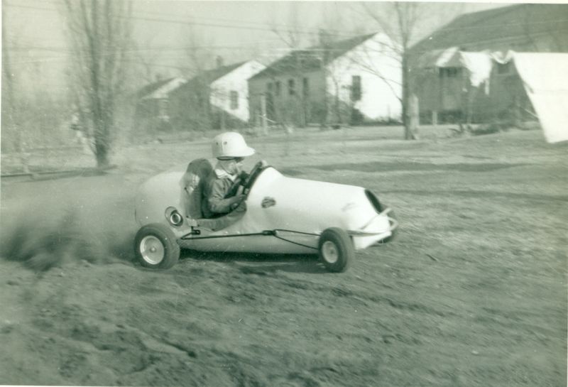 Mike practicing in his uncle's backyard, age 5