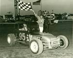Mike winning the trophy dash at 81 Speedway in 1973