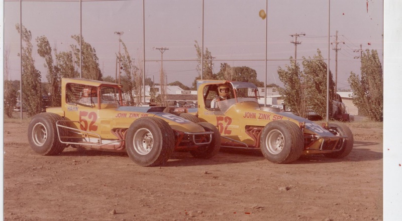EMMETT HAHN ON RIGHT &SON TOMMY IN CAR ON LEFT