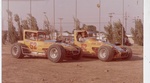 EMMETT HAHN ON RIGHT &SON TOMMY IN CAR ON LEFT